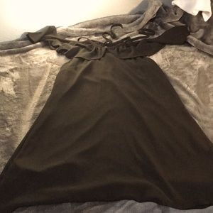 A black medium length dress